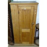 A panelled pine cupboard with single panel door, W83cm, H167cm