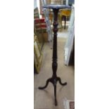 A mahogany torchere stand on tripod base, H121cm