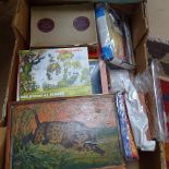 2 boxes of jigsaw puzzles