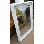 A modern white painted framed bevelled-edge wall mirror, L110cm, H79cm