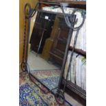 A wrought-iron framed wall mirror, W78cm