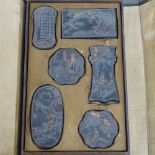 A boxed set of Japanese blocks with painted and gilded designed, and script verso