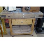 A Vintage rectangular butcher's block, on later stand, L122cm, H96cm