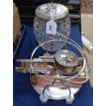 A cut-glass silver-mounted biscuit barrel, a silver-mounted comb, a plated stand etc