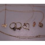 A collection of 10ct gold necklaces and rings