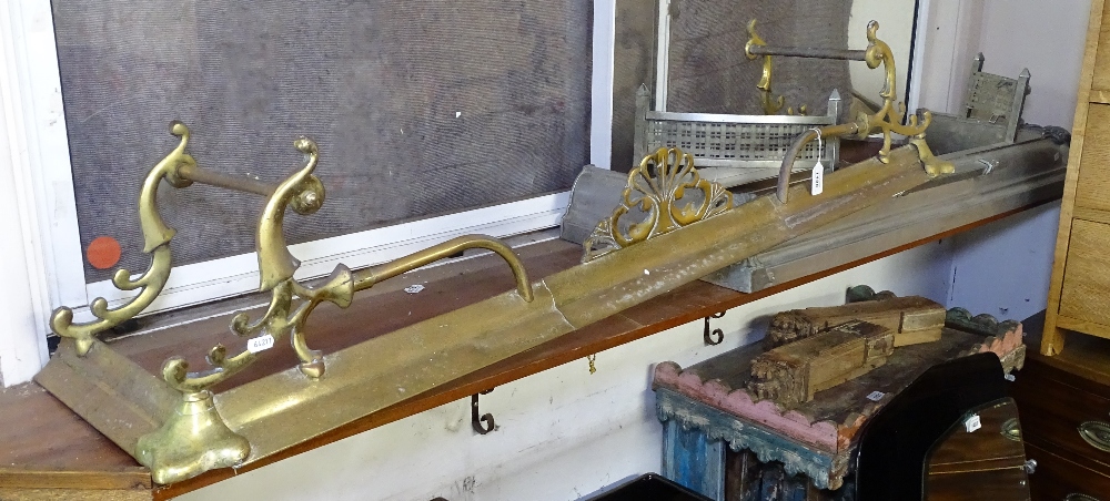 A Victorian brass fender, and a steel fender (2)