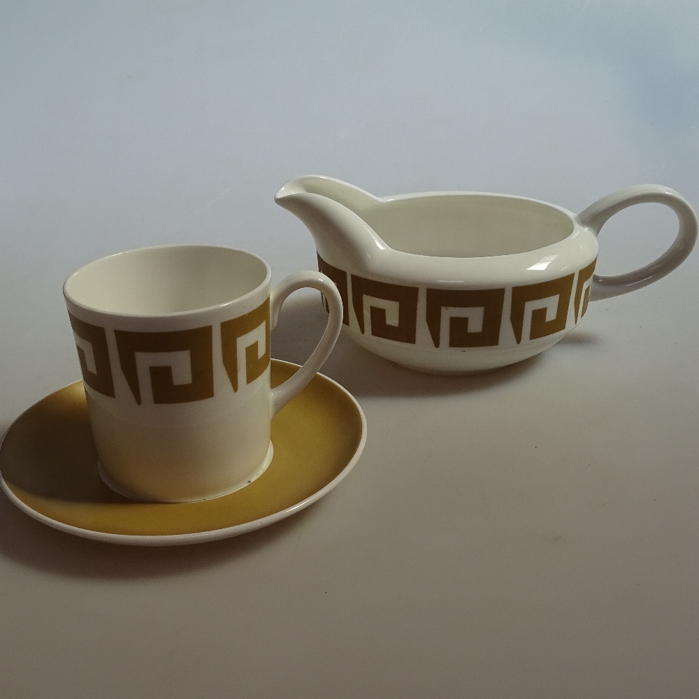 A Wedgwood/Susie Cooper Old Gold keystone pattern dinner service, and coffee cans and saucers