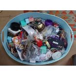 A large tub of modern costume jewellery