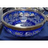 An overlay cut-glass fruit bowl with silver rim