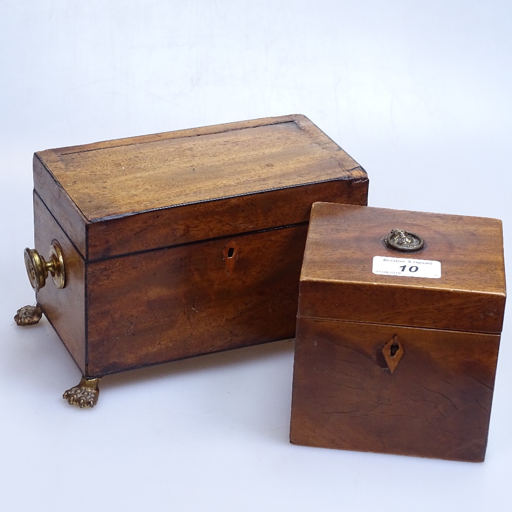 A Georgian caddy on brass paw feet, height 5", and an Antique mahogany caddy