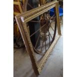 A large giltwood and gesso picture frame, W155cm, H107cm, picture size is 131.5cm x 82.5cm approx