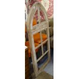 A pair of Gothic pine arch-top window frames