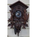 A Black Forest cuckoo clock, height 11"