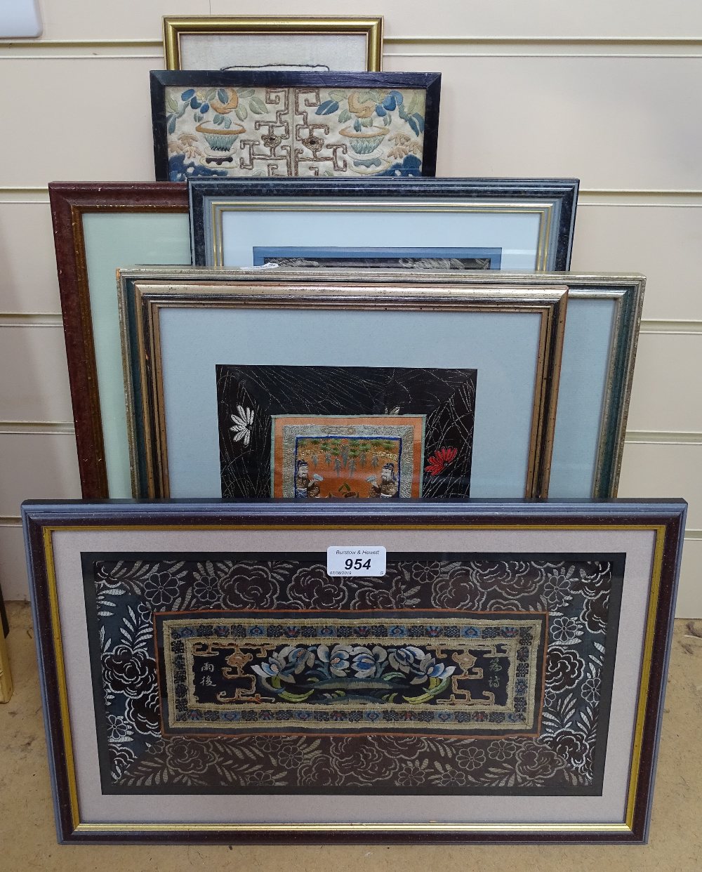 Various Oriental embroideries, framed (8)