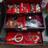 A cantilever jewellery box and a quantity of costume jewellery