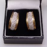 A pair of 9ct gold and diamond cluster panel earrings