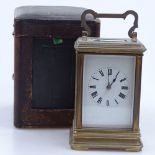 A French brass-cased carriage clock, early 20th century, 8-day movement, case height 12cm, in