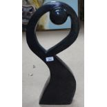 A stylised soapstone sculpture, 23"