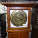 An Art Deco style oak-cased clock, with brass dial and quartz movement, H180cm