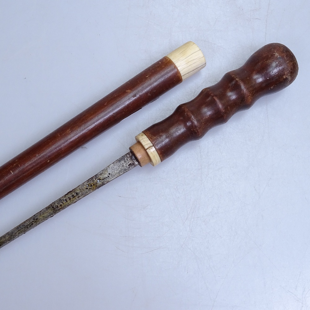 A teak sword stick with ivory mount