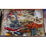 Assorted costume jewellery, including beads, brooches and necklaces