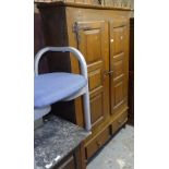 A Continental oak jam cupboard, with 2 panelled doors and drawer under, W110cm, H164cm