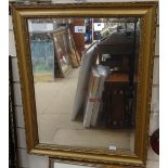 A bevelled-edge wall mirror in embossed gilt frame, height 60cm