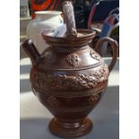 A salt glaze stoneware flagon with relief decoration, height 30cm