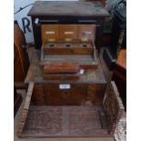A table-top cabinet, height 30.5cm, a desk stand, weights, a spirit level, a writing slope, and an