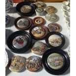 A collection of Victorian Prattware pot lids etc