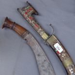 A kukri knife in scabbard with silver wire decoration, length 60cm, and another