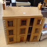 A plywood Georgian style doll's house, height 95cm, together with furniture, accessories, doll's
