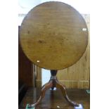 A George III oak tilt-top table on tripod base, W73cm