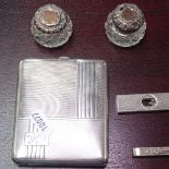 An Art Deco engine turned silver cigarette box, a silver cigar cutter, a tie pin, and 2 silver-