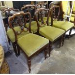 A set of 6 William IV rosewood dining chairs, with carved splat backs, upholstered seats, raised