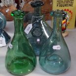 A blue Studio glass seal-front bottle decanter, height 22cm, and 2 other Studio glass bottles (3)