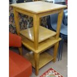 A pair of square light oak 2-tier lamp tables on square tapered legs, W60cm, H56cm
