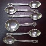 A set of 5 Georg Jensen Danish sterling silver teaspoons, and matching caddy spoon
