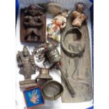 A carved wood figure, 12cm, a prayer wheel, a cuff, a Buddha's head etc