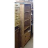 A Corona pine floor standing open bookcase with 2 drawers, W96cm, H188cm