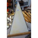 A leaded light triangular table lamp on wooden plinth, height 45cm