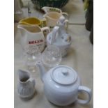 Various bar jugs, a teapot etc
