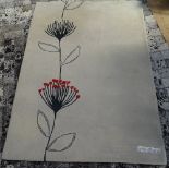 A beige black Banksia wool rug, 180cm x 120cm