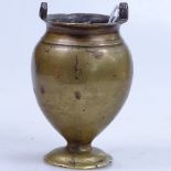 A bronze 2-handled urn, 11.5cm