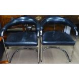 A pair of Thonet cantilever armchairs, in original black leather, by Anton Lorenz, with maker's