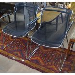 A pair of Charles Pollock "Penelope" armchairs in chrome steel and black mesh, by Castelli, Italy