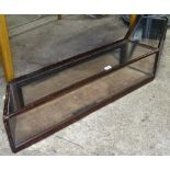 A Victorian glass and mahogany-framed table-top display cabinet, with mirror back, L140cm