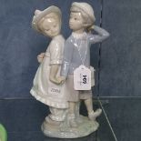 Lladro boy and girl group, 24.5cm