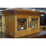 A 2-door cedarwood table-top humidor, W70cm, H37cm