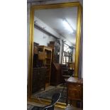 A large modern gilt-framed rectangular wall mirror, L265cm, H145cm